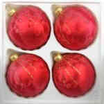 A set of 4 handmade christmas ornaments in "red with golden drops" in a ball shape.