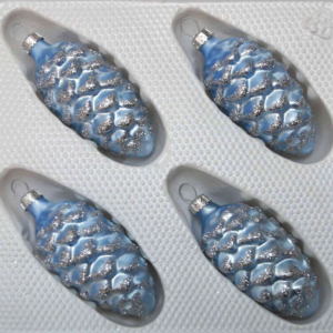 A set of 4 handmade christmas ornaments in "blue silver" in a pinecone shape.