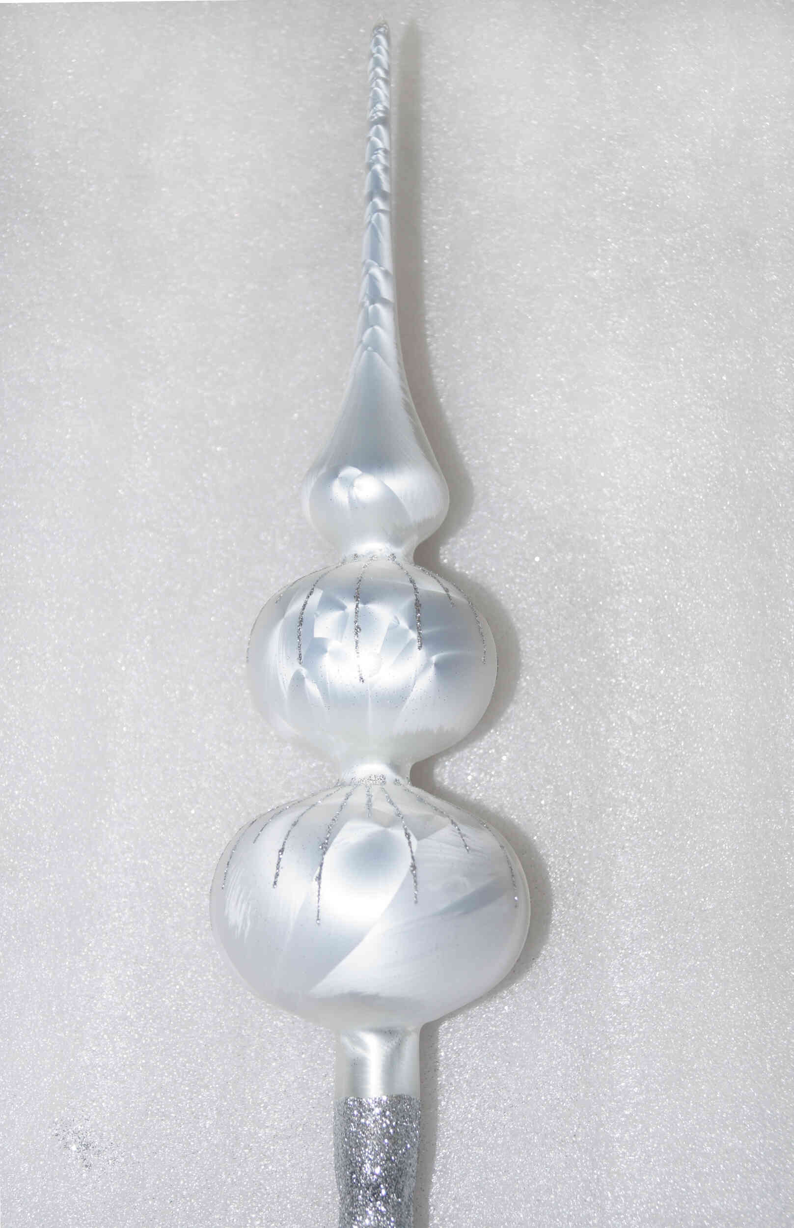 One handmade christmas tree topper in "white with silver drops".