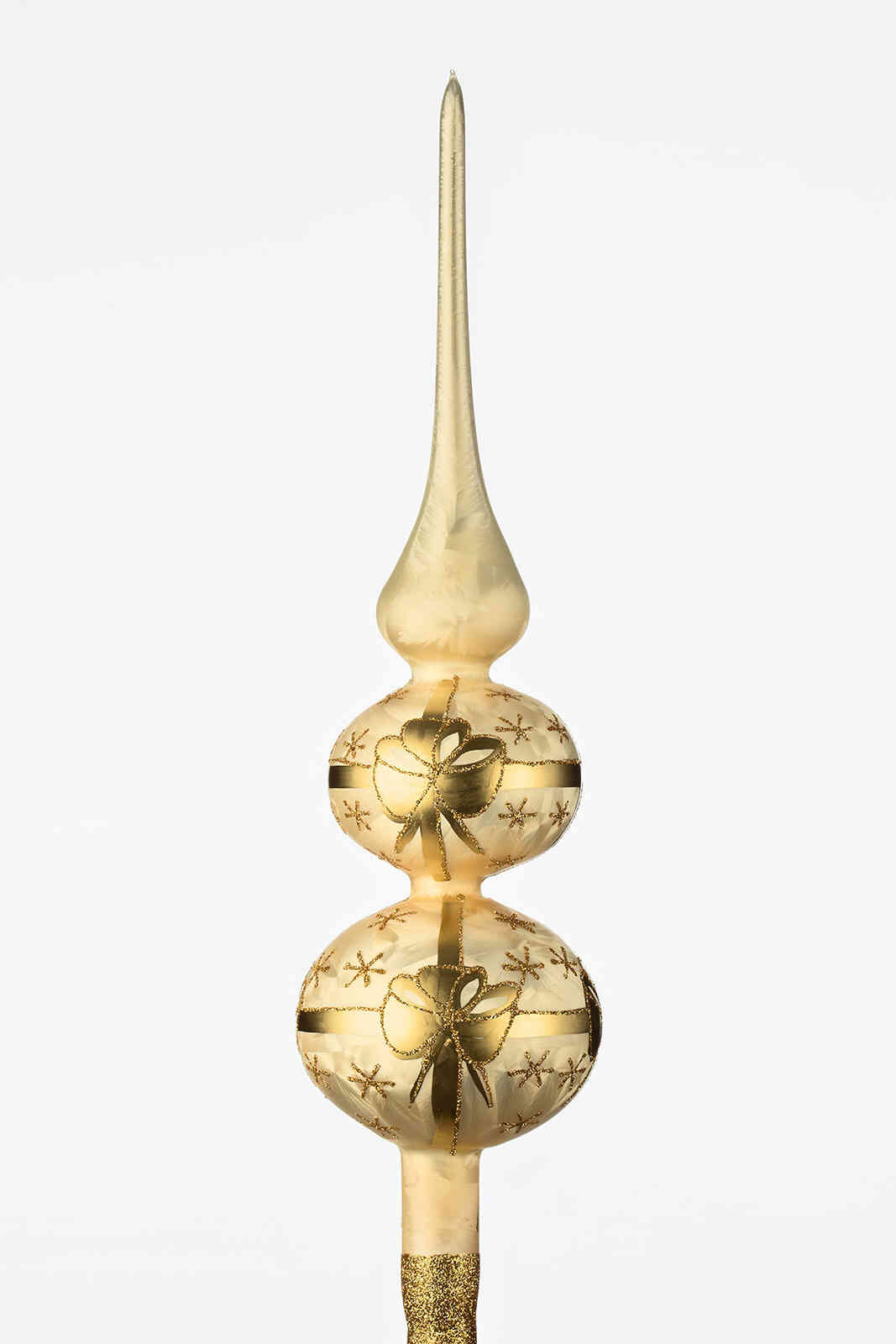 One handmade christmas tree topper in "golden with bows".